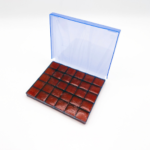 A sealed container holding white ketamine lozenges, a research chemical for laboratory use.